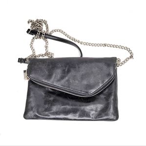 Hobo black leather chain crossbody with flap. Red interior.